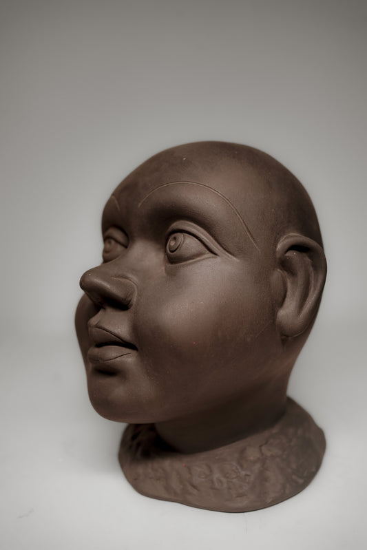 Ethnic Black Terracotta Baby Face Sculpture – Handmade Accent